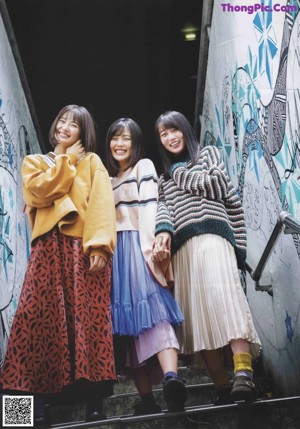 A group of young women posing for a photo together.