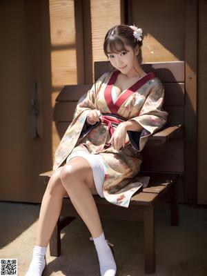 A woman in a pink dress sitting on a wooden bench.
